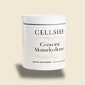 CELLSHE creatine monohydrate dietary supplement container, front label, 50 servings, on a cream background.
