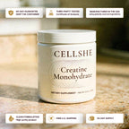 CELLSHE creatine monohydrate container on a kitchen counter with badges: third-party tested, manufactured in the USA, 60-day supply