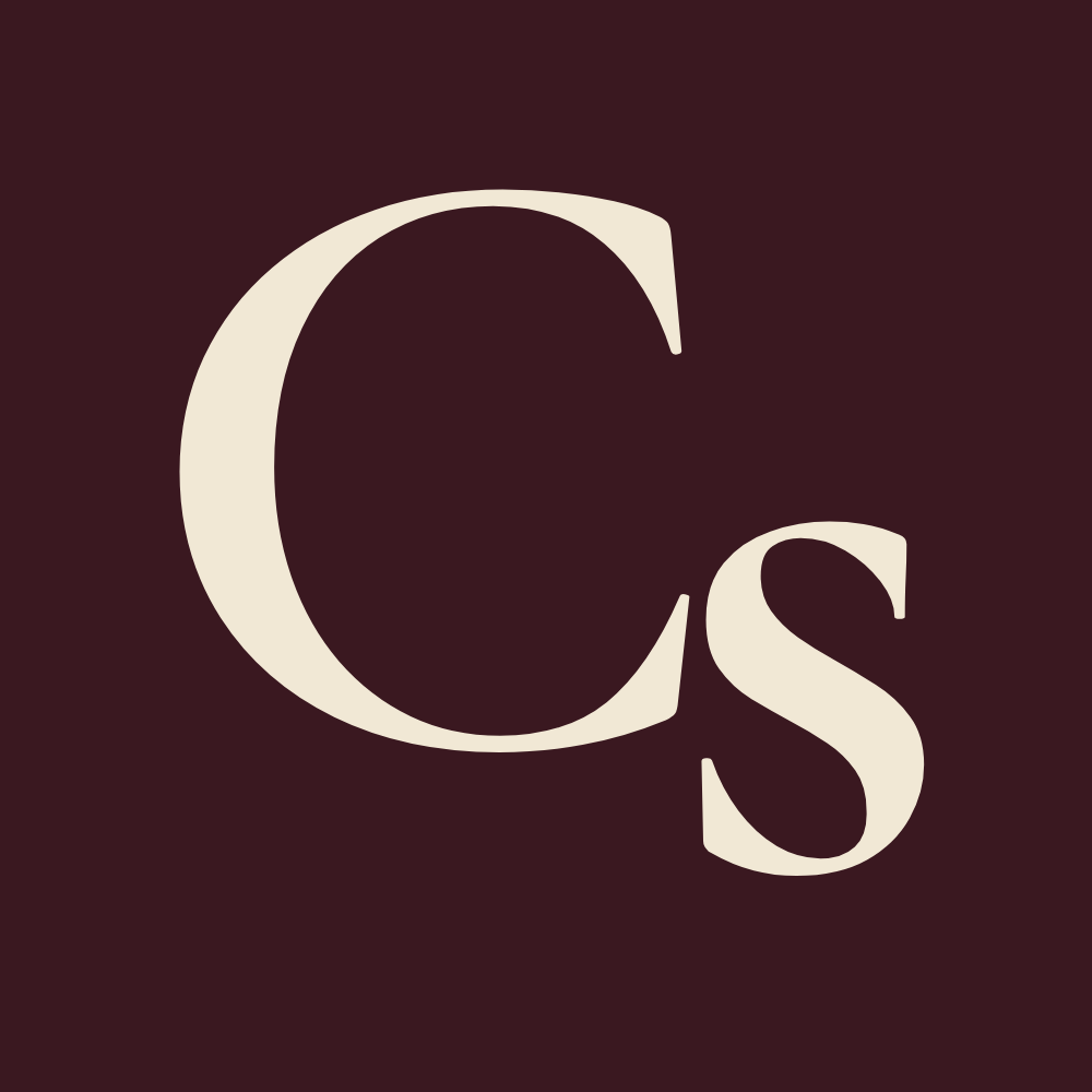 Cream 'CS' logo on deep burgundy background